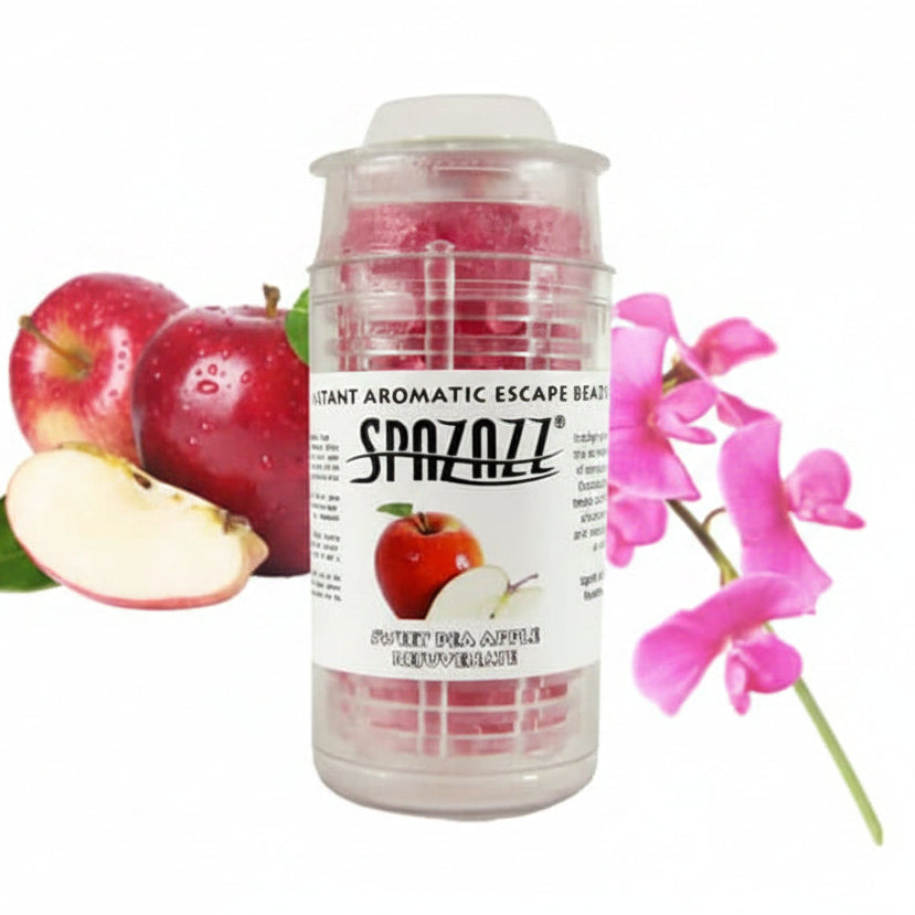 A clear plastic jar of Spazazz Instant Aromatic Escape Beads, filled with pinkish-red beads, shown with apple graphics and pink flowers on a white background.